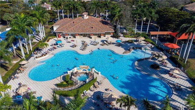 community pool with a patio