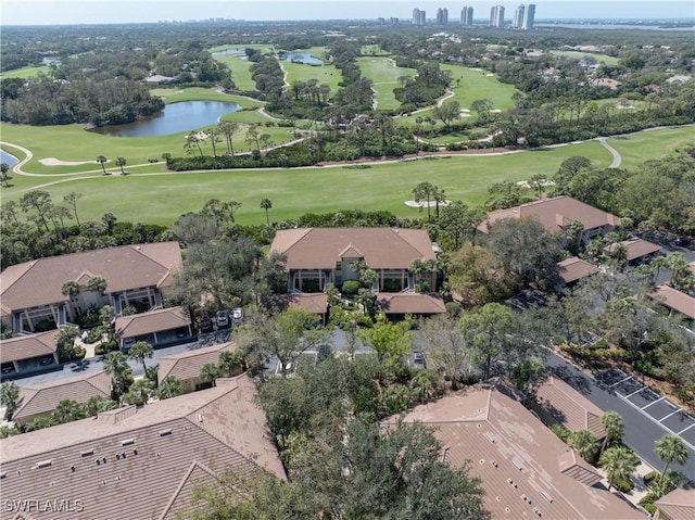 bird's eye view featuring a water view and golf course view