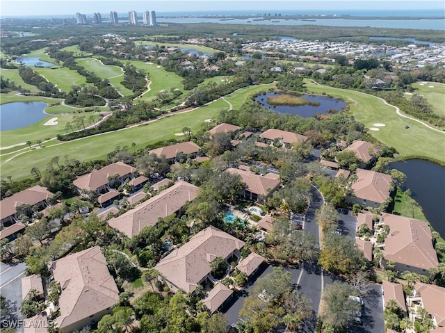 aerial view featuring a residential view, a water view, and golf course view