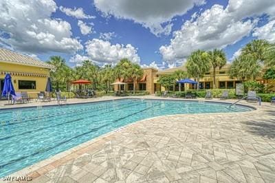 pool with a patio