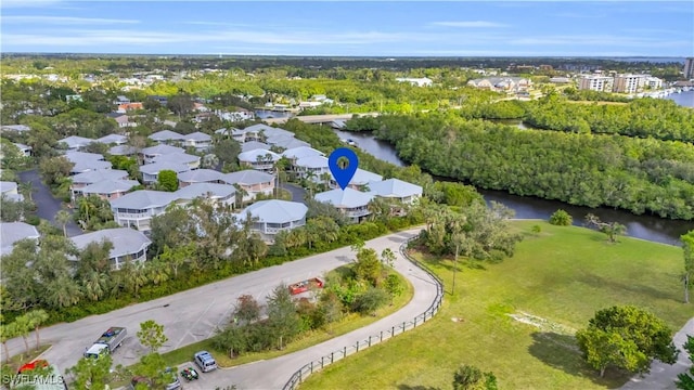 drone / aerial view with a water view