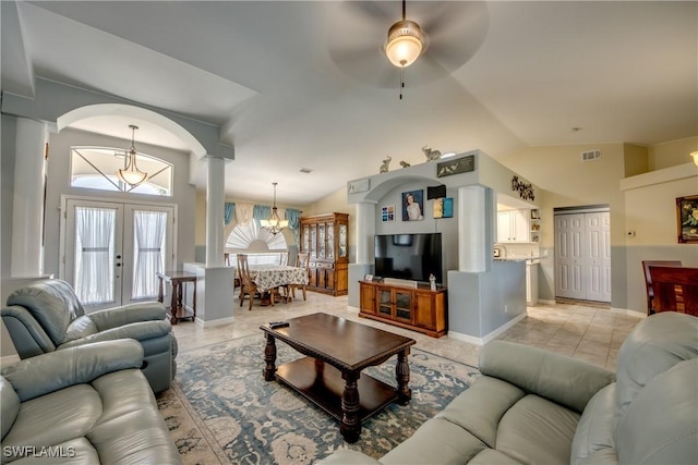 living room featuring french doors, a notable chandelier, visible vents, light tile patterned flooring, and vaulted ceiling