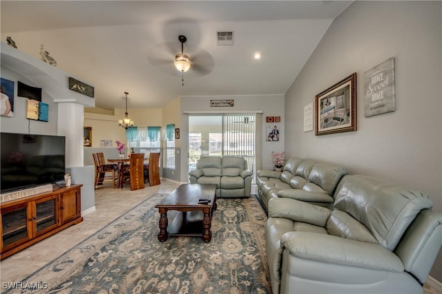 living room with a ceiling fan, lofted ceiling, and visible vents