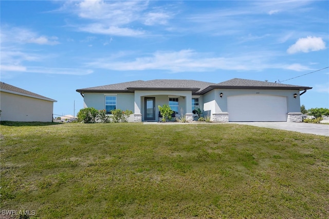 view of front of home with a garage, concrete driveway, a front yard, and stucco siding