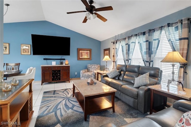 1442 SE 15th Ter, Cape Coral, FL 33990 - living room with lofted ceiling, ceiling fan, plenty of natural light, and light tile patterned flooring