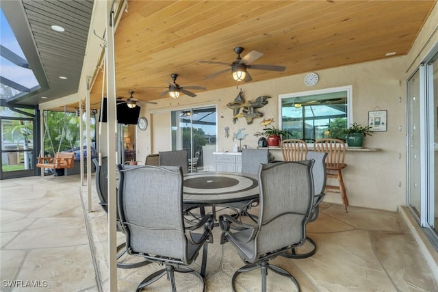 1442 SE 15th Ter, Cape Coral, FL 33990 - view of patio with outdoor dining area, ceiling fan, and a lanai