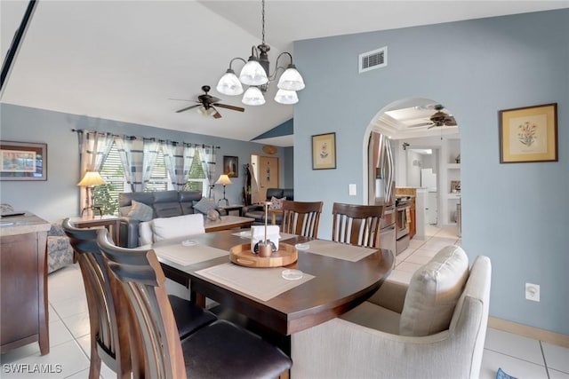 1442 SE 15th Ter, Cape Coral, FL 33990 - dining room featuring a ceiling fan, lofted ceiling, arched walkways, light tile patterned floors, and a chandelier