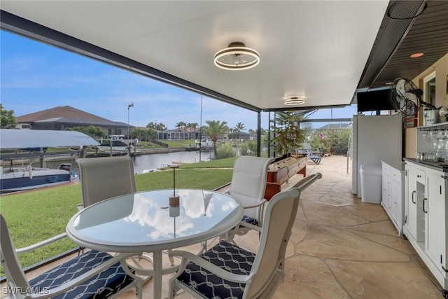 1442 SE 15th Ter, Cape Coral, FL 33990 - view of patio featuring a water view, outdoor dining area, and area for grilling