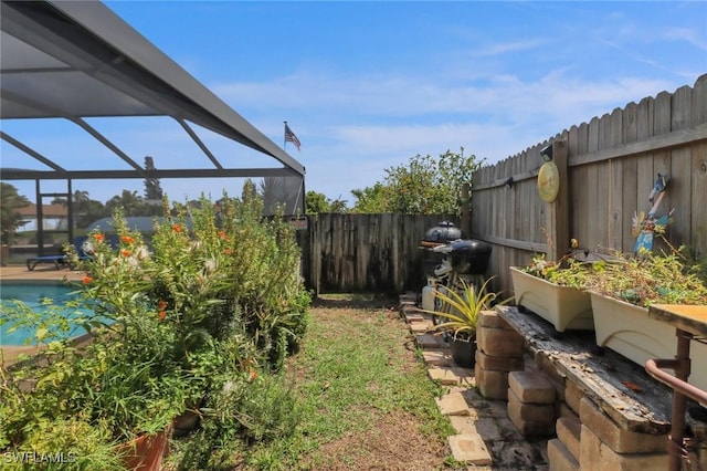 1442 SE 15th Ter, Cape Coral, FL 33990 - fenced backyard featuring glass enclosure