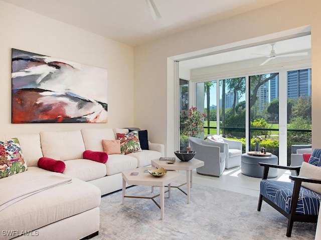 living room featuring a ceiling fan