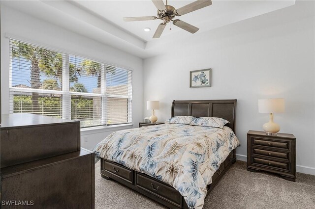 carpeted bedroom featuring a ceiling fan, recessed lighting, and baseboards