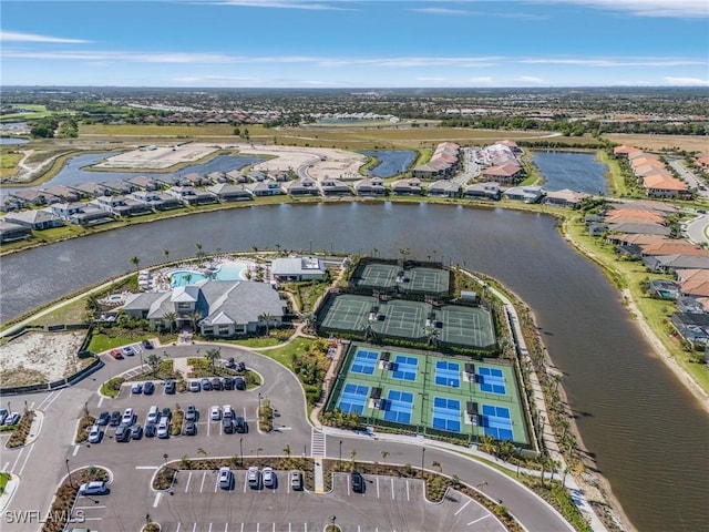 birds eye view of property featuring a water view