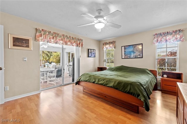 bedroom featuring light wood-type flooring, access to outside, baseboards, and a ceiling fan