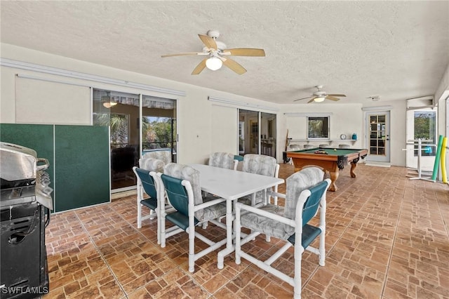 view of patio featuring ceiling fan and outdoor dining space