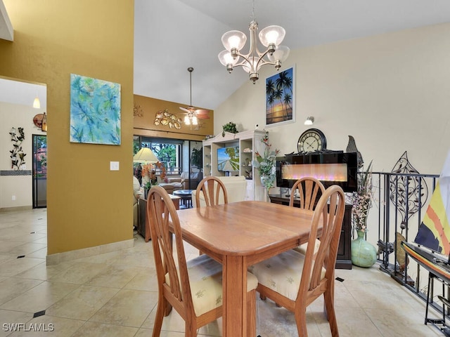 dining space featuring light tile patterned floors, baseboards, high vaulted ceiling, and ceiling fan with notable chandelier