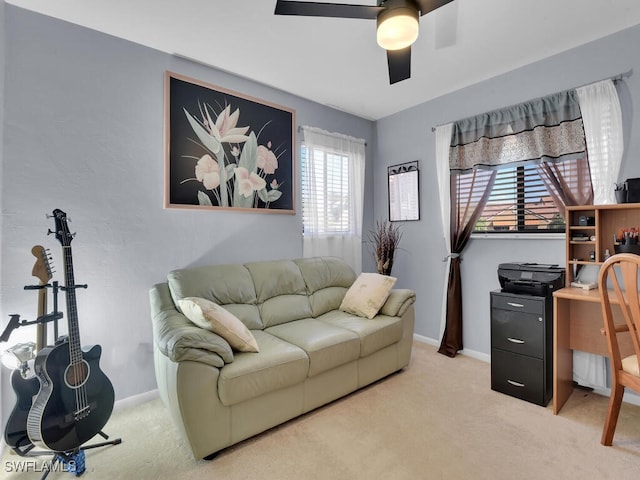 office with carpet, baseboards, and a ceiling fan