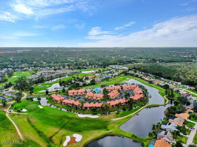 aerial view featuring view of golf course and a water view