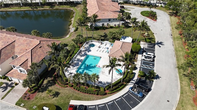 birds eye view of property featuring a water view