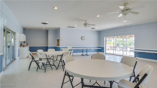 dining area with recessed lighting, visible vents, light speckled floor, and a textured ceiling