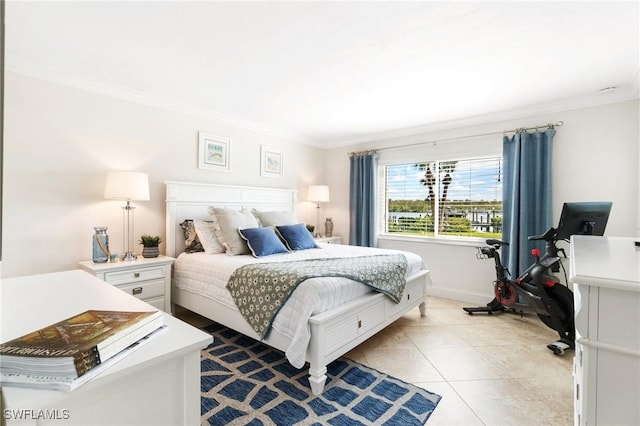 bedroom with ornamental molding, light tile patterned flooring, and baseboards