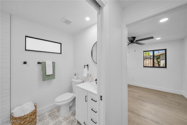 bathroom with recessed lighting, baseboards, visible vents, and toilet