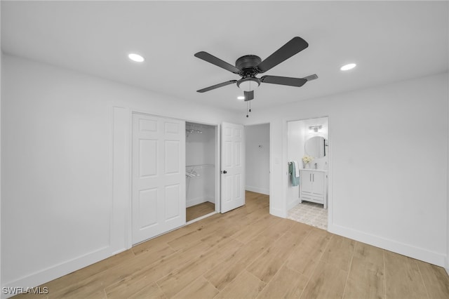 unfurnished bedroom with light wood-type flooring, visible vents, baseboards, and recessed lighting