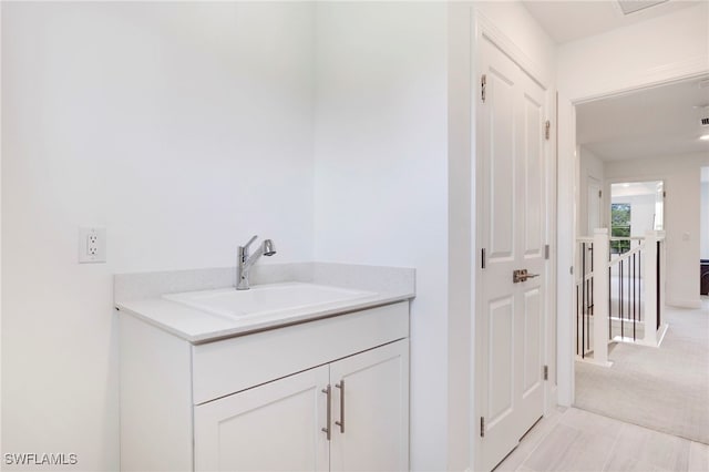 bathroom with visible vents and vanity