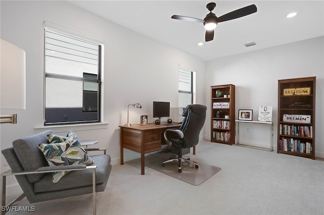 carpeted home office with a ceiling fan, recessed lighting, visible vents, and baseboards