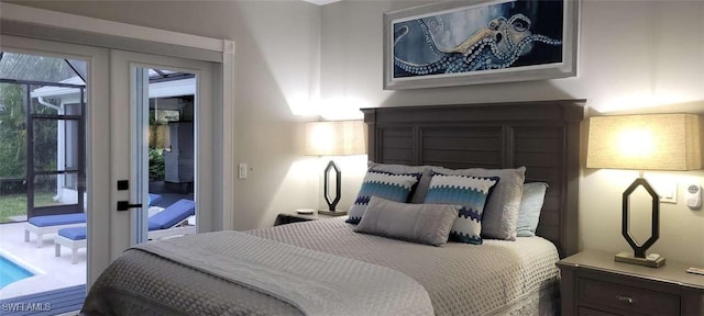 bedroom featuring access to outside, multiple windows, and french doors