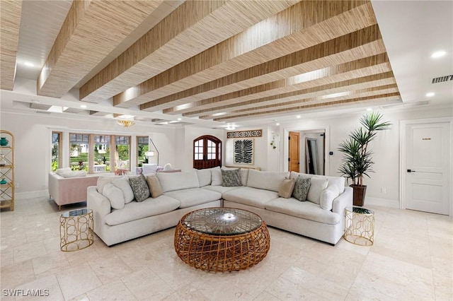 living room with recessed lighting, beam ceiling, visible vents, and baseboards