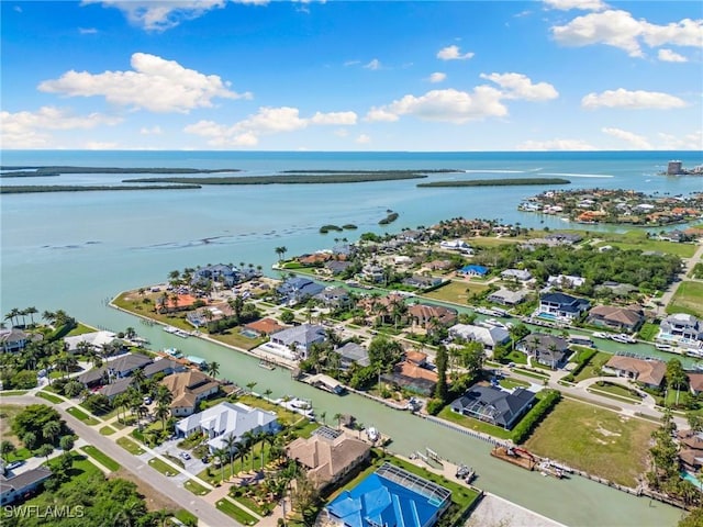 aerial view with a water view and a residential view