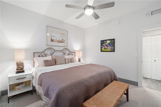 bedroom with ceiling fan and baseboards