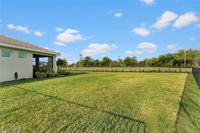 view of yard with a fenced backyard