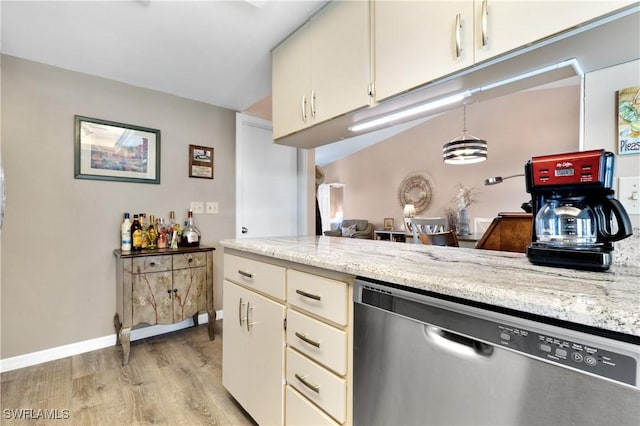 kitchen featuring baseboards, light wood-style flooring, stainless steel dishwasher, and light stone countertops