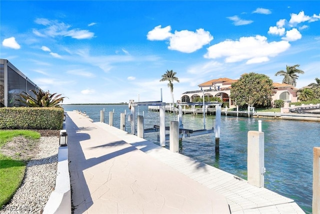 view of dock featuring a water view and boat lift