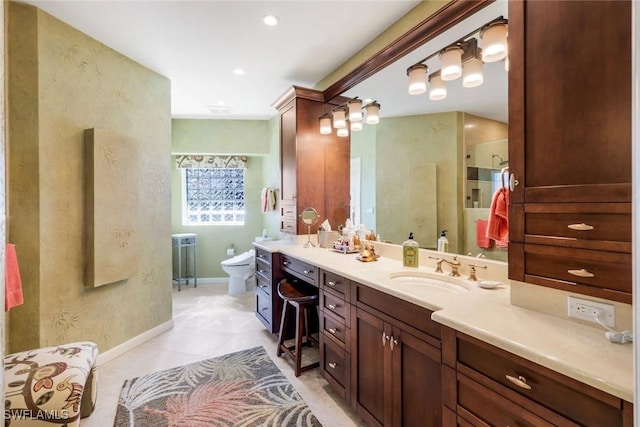 full bath featuring baseboards, toilet, tile patterned floors, vanity, and a walk in shower