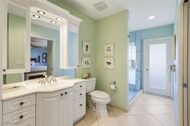 ensuite bathroom with a stall shower, visible vents, toilet, ensuite bathroom, and tile patterned flooring