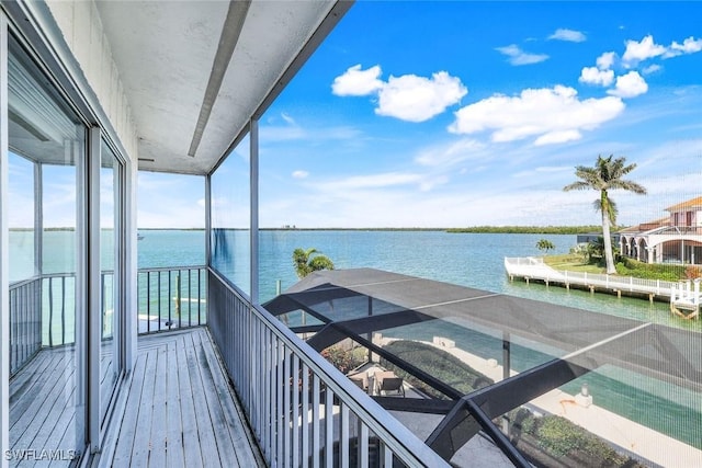 balcony featuring a water view