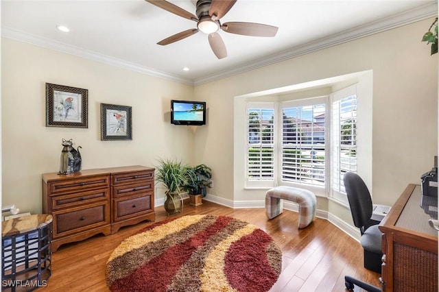 home office featuring baseboards, a ceiling fan, light wood-style flooring, crown molding, and recessed lighting