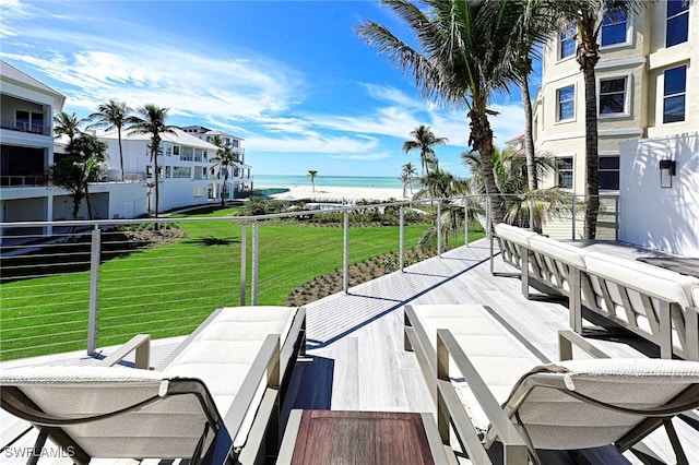 exterior space featuring a water view and a balcony