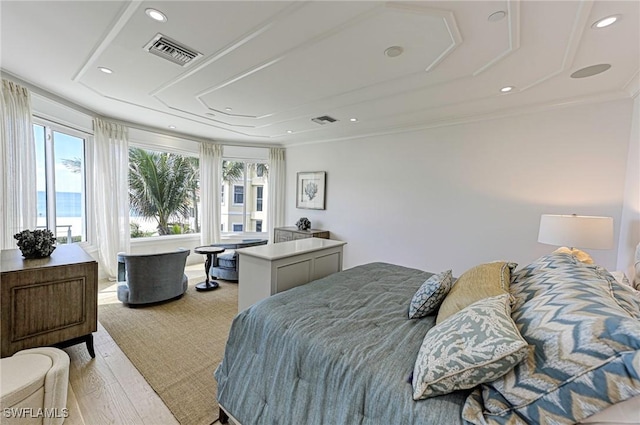 bedroom featuring light wood-style floors, recessed lighting, and visible vents