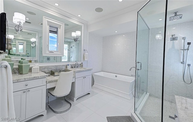 full bath with a stall shower, ornamental molding, tile patterned floors, a freestanding bath, and vanity