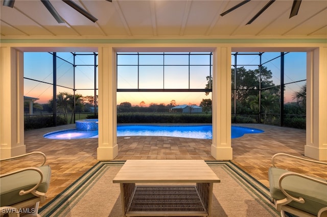 view of swimming pool with a pool with connected hot tub