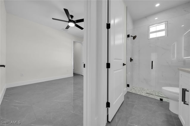 bathroom featuring a marble finish shower, baseboards, toilet, ceiling fan, and marble finish floor