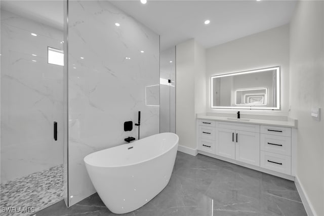 bathroom with recessed lighting, vanity, marble finish floor, a soaking tub, and a marble finish shower