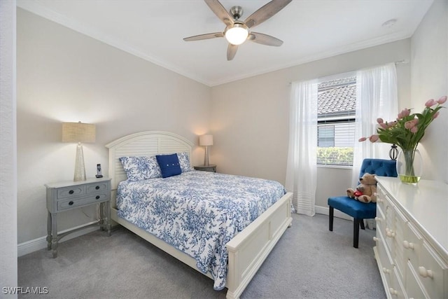 bedroom with ornamental molding, carpet, and baseboards