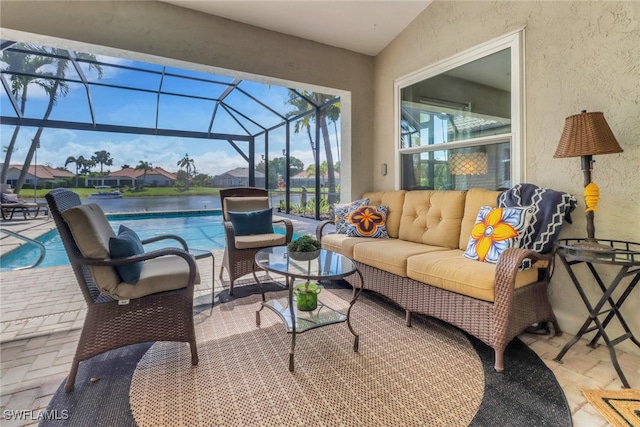 view of patio / terrace featuring outdoor lounge area, a lanai, and an outdoor pool