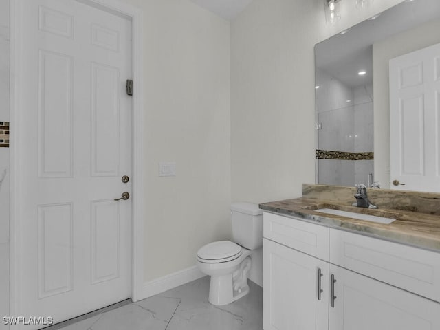 full bath with vanity, baseboards, tiled shower, toilet, and marble finish floor