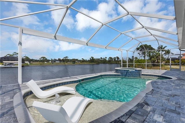 view of pool featuring a patio, a water view, a pool with connected hot tub, and a lanai