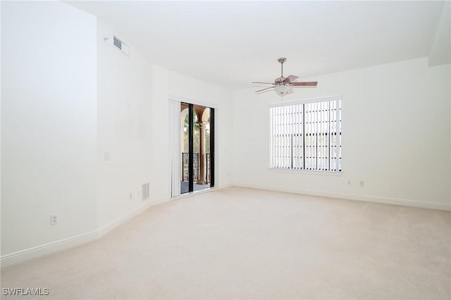 23159 Amgci Way Unit 3108, Estero, FL 33928 - empty room with light carpet, ceiling fan, and baseboards